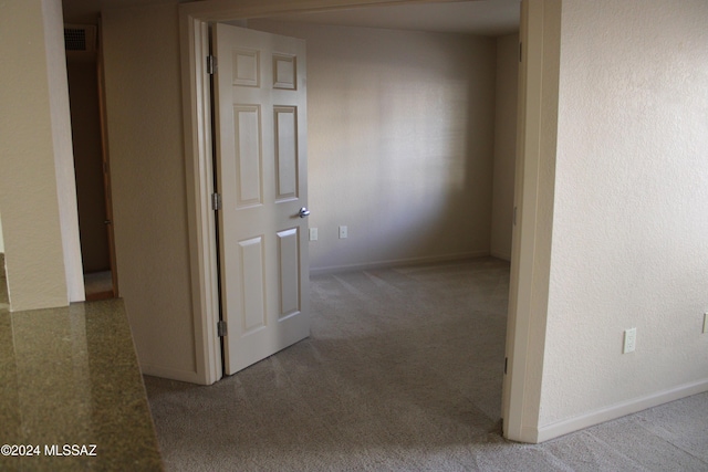 corridor featuring carpet floors