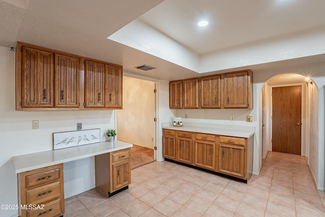 kitchen with light tile patterned floors