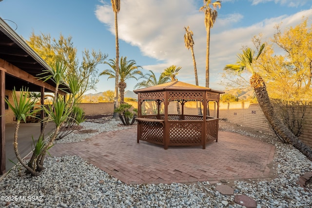 view of patio / terrace featuring a mountain view and a gazebo