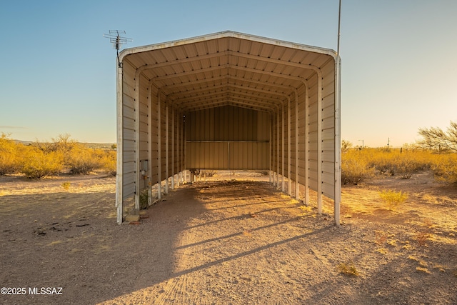 view of outbuilding with a carport