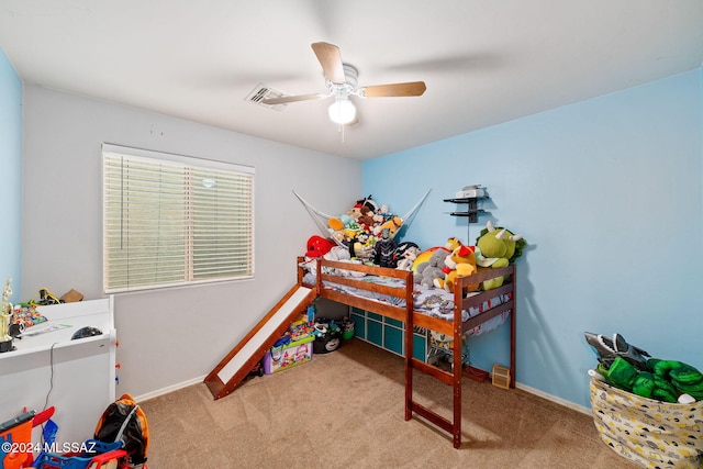 carpeted bedroom featuring ceiling fan