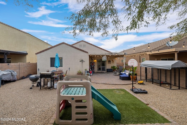 view of play area with a patio area