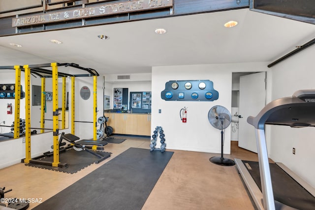 exercise room with electric panel