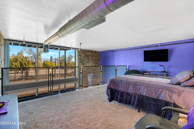 bedroom featuring carpet