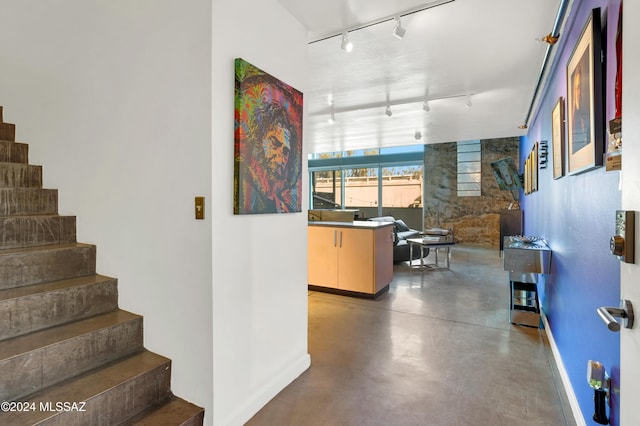 interior space featuring concrete flooring