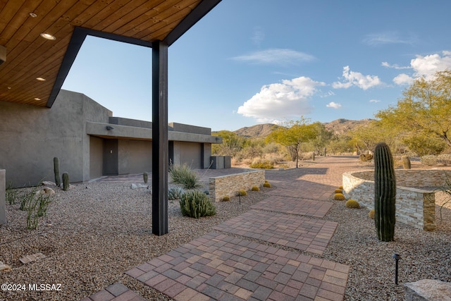 view of patio / terrace with a mountain view