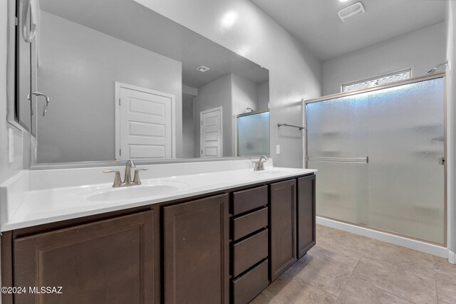 interior space featuring light carpet, sink, and ceiling fan