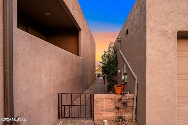 view of property exterior at dusk