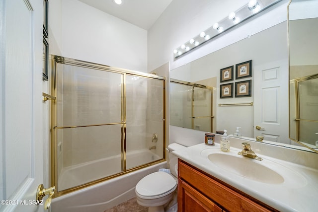 full bathroom with vanity, toilet, and enclosed tub / shower combo