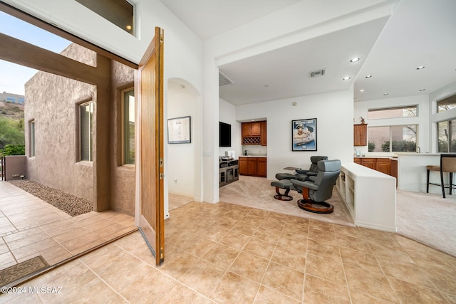 interior space featuring light tile patterned floors