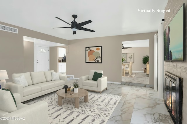 living room with ceiling fan