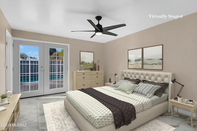 bedroom featuring access to outside, ceiling fan, and french doors