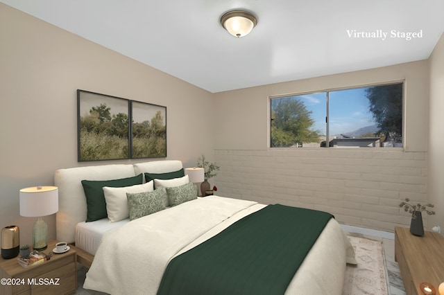 bedroom featuring wood-type flooring