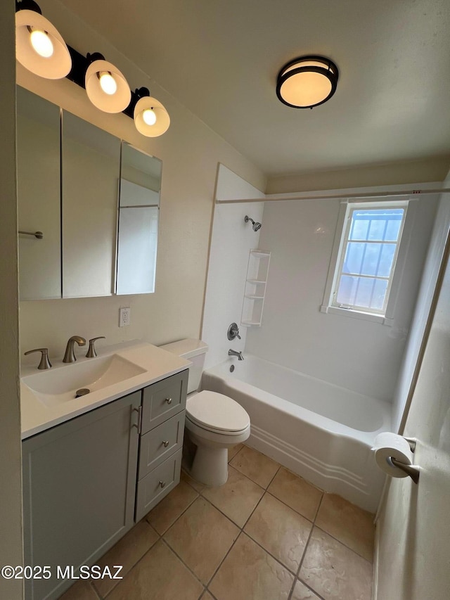 full bathroom featuring vanity, tile patterned floors, shower / bathtub combination, and toilet