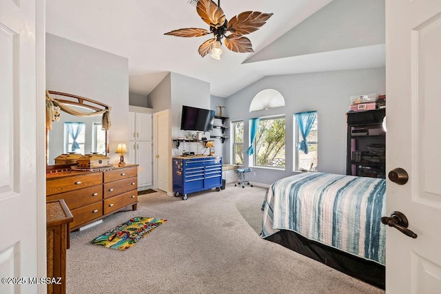 bedroom with light carpet, baseboards, a ceiling fan, and vaulted ceiling