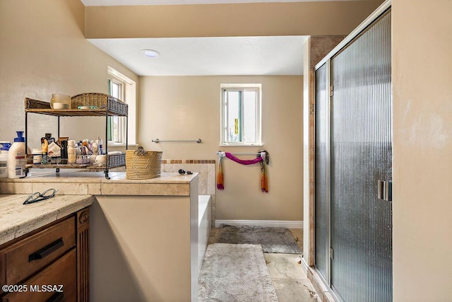full bath with a shower stall and a bath