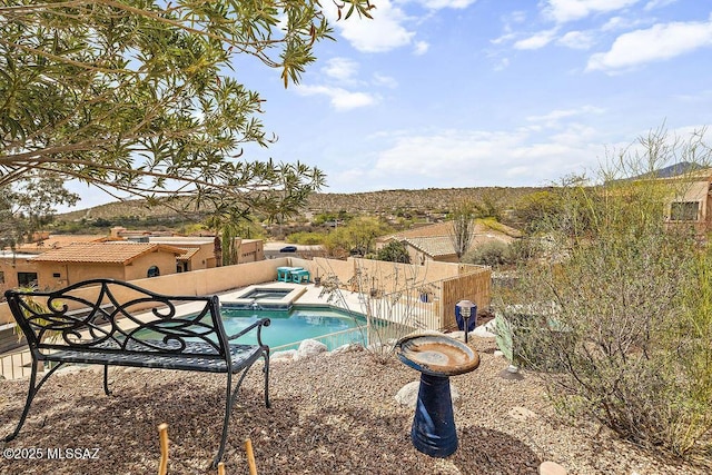 view of swimming pool with a fenced in pool, a patio, and a fenced backyard