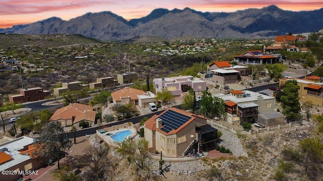 aerial view featuring a mountain view and a residential view