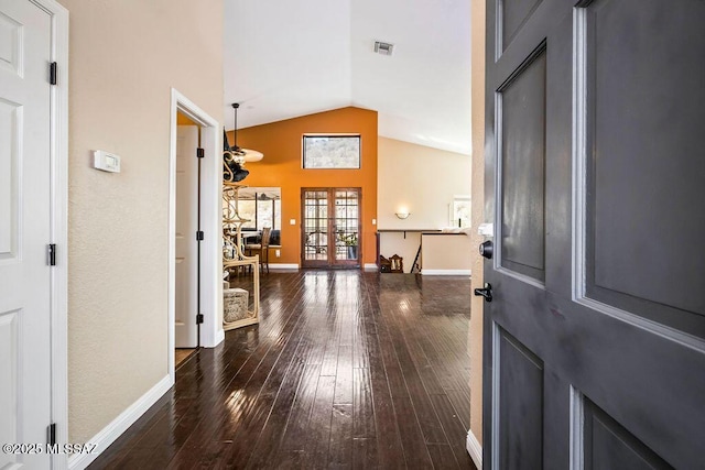 entrance foyer with french doors, baseboards, wood-type flooring, and visible vents