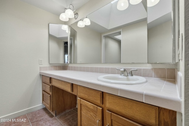 bathroom featuring tile patterned floors and vanity