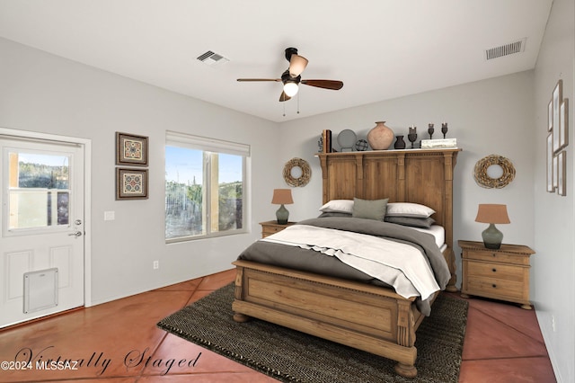 bedroom featuring ceiling fan and tile patterned flooring