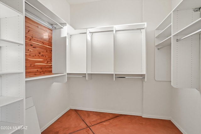 spacious closet with tile patterned flooring