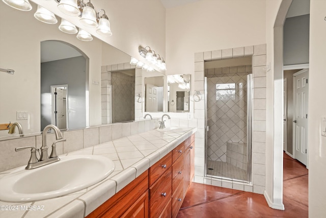 bathroom featuring vanity and walk in shower