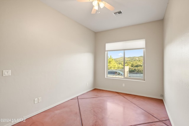 empty room featuring ceiling fan