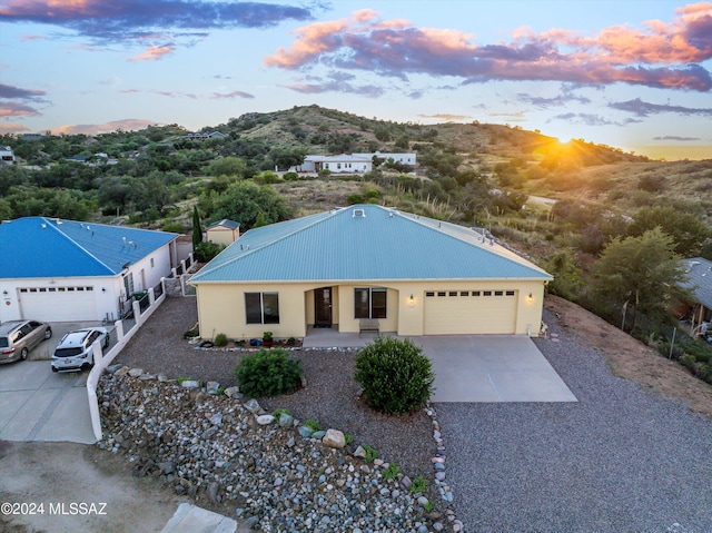 view of front of property featuring a garage