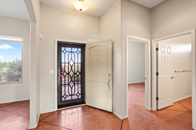 foyer with tile patterned floors