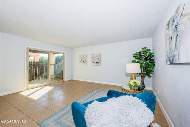 interior space featuring baseboards and tile patterned floors