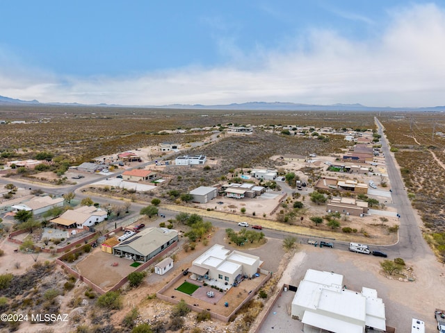 drone / aerial view featuring a mountain view