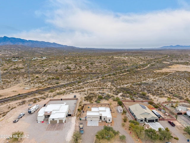 birds eye view of property featuring a mountain view