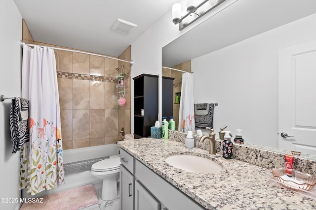 full bathroom featuring shower / tub combo with curtain, vanity, and toilet