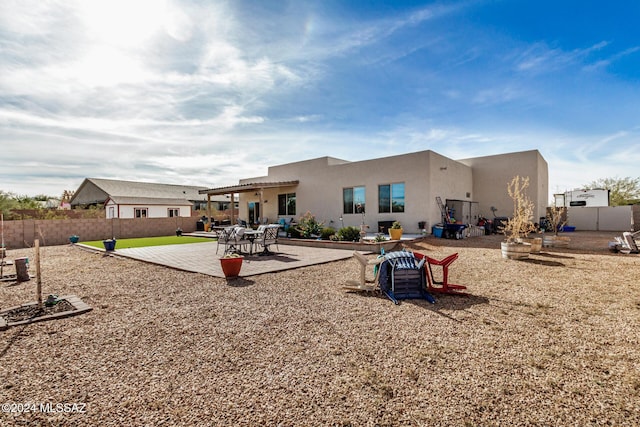 exterior space with a patio area