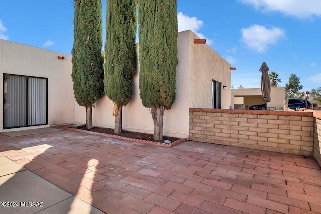 view of patio / terrace with fence