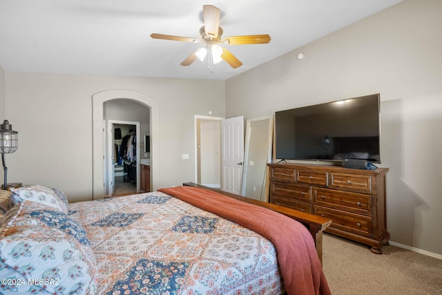 carpeted bedroom featuring ceiling fan and lofted ceiling