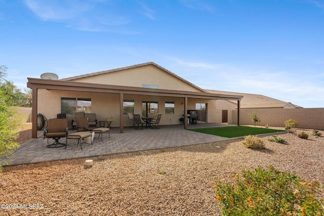 rear view of house with a patio area