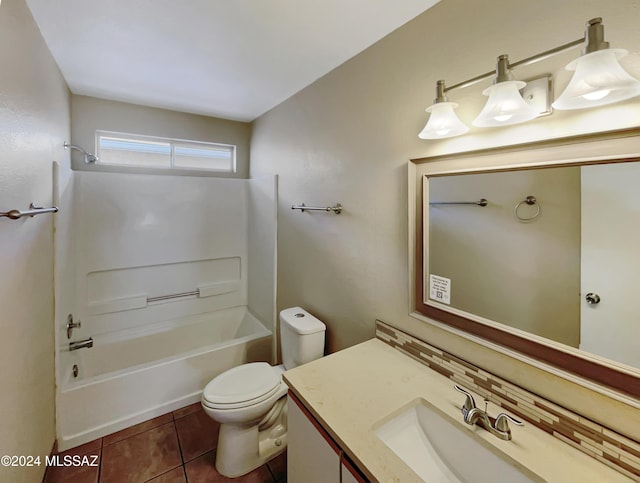 full bathroom featuring tile patterned floors, vanity,  shower combination, and toilet