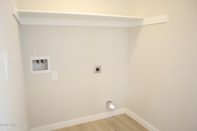 laundry room featuring electric dryer hookup, wood-type flooring, and hookup for a washing machine