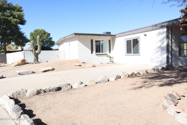 rear view of house featuring a patio area