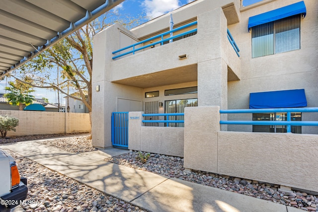 view of patio with a balcony