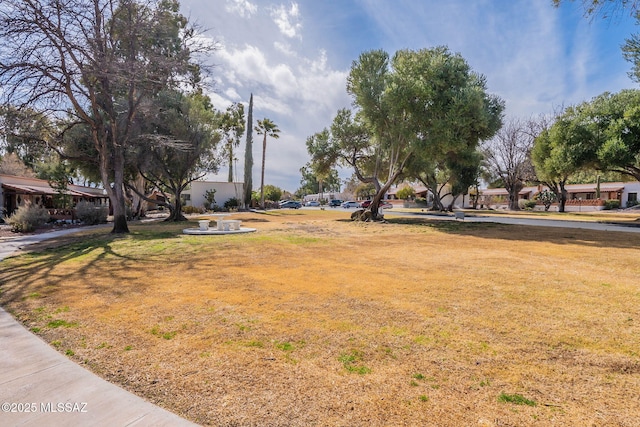 view of home's community featuring a yard