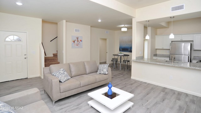 living room with light wood-type flooring