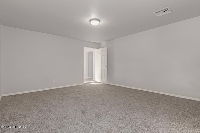 unfurnished room featuring carpet floors