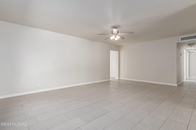 empty room featuring ceiling fan