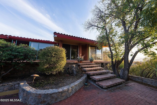 view of front of property with a patio