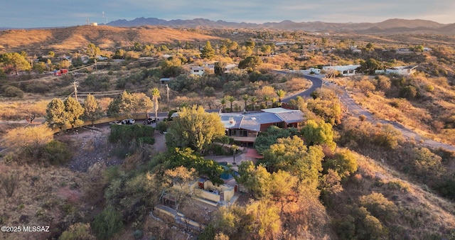 drone / aerial view featuring a mountain view