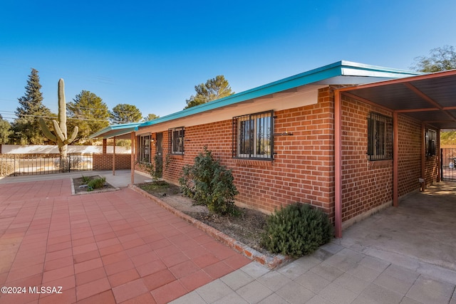 view of home's exterior featuring a patio area