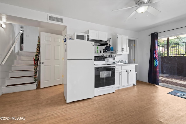 kitchen featuring light hardwood / wood-style floors, ceiling fan, white cabinetry, and white appliances